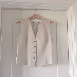 Women’s Zara 4 button vest.